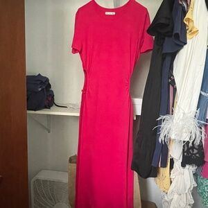 Long pink vacation dress with cut out in waist